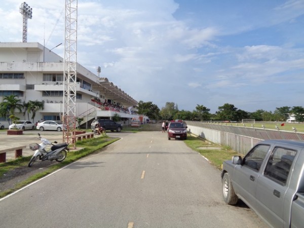 inadequately covered grandstand, then there was a road, then there was a running track and eventually there was the pitch