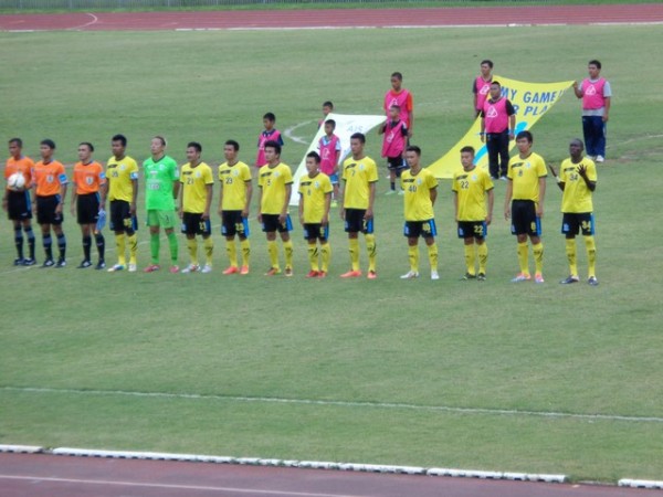 Playing in yellow.