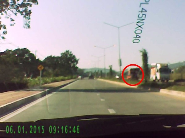 Songtaew heading down wrong side to turn right opposite Hua Hin Soi 10.