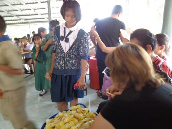 the older kids now queued up for treats.