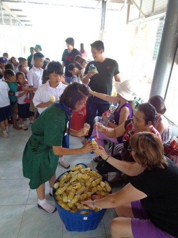the older kids now queued up for treats.