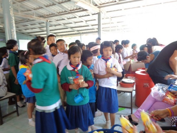 the older kids now queued up for treats.